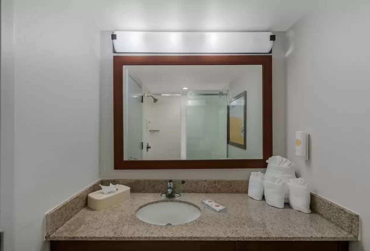 Desk, laptop workspace, blackout curtains, iron/ironing board