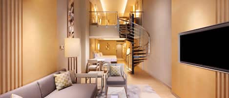 Family Suite, 1 King Bed, Balcony (Duplex) | Living area | 40-inch flat-screen TV with satellite channels, TV, iPod dock