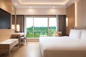 Deluxe Suite, 1 King Bed, Golf View | Minibar, in-room safe, desk, blackout drapes