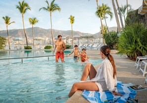 2 outdoor pools, open 8:00 AM to 8:00 PM, pool loungers