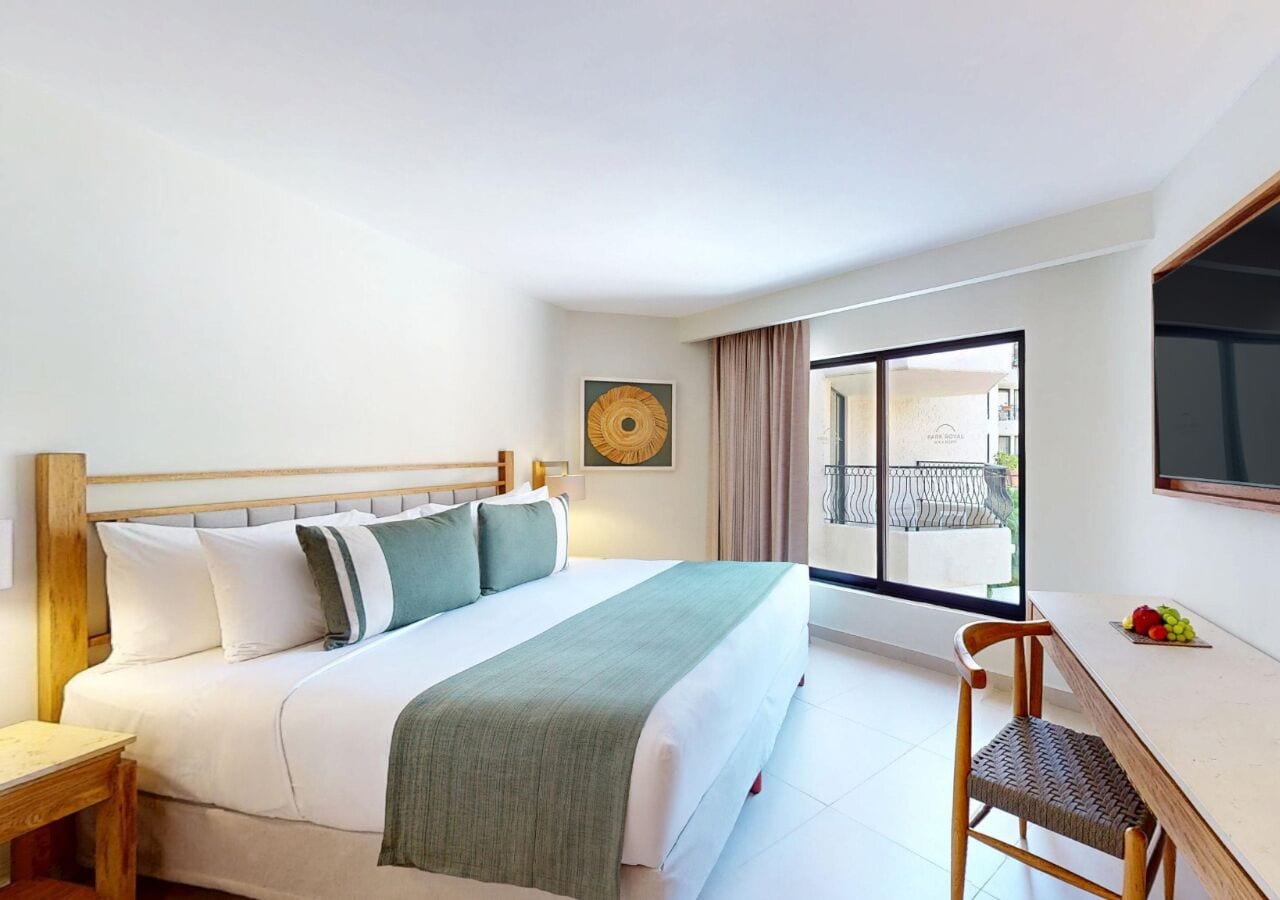 Deluxe Pool View King | In-room safe, desk, blackout drapes, iron/ironing board