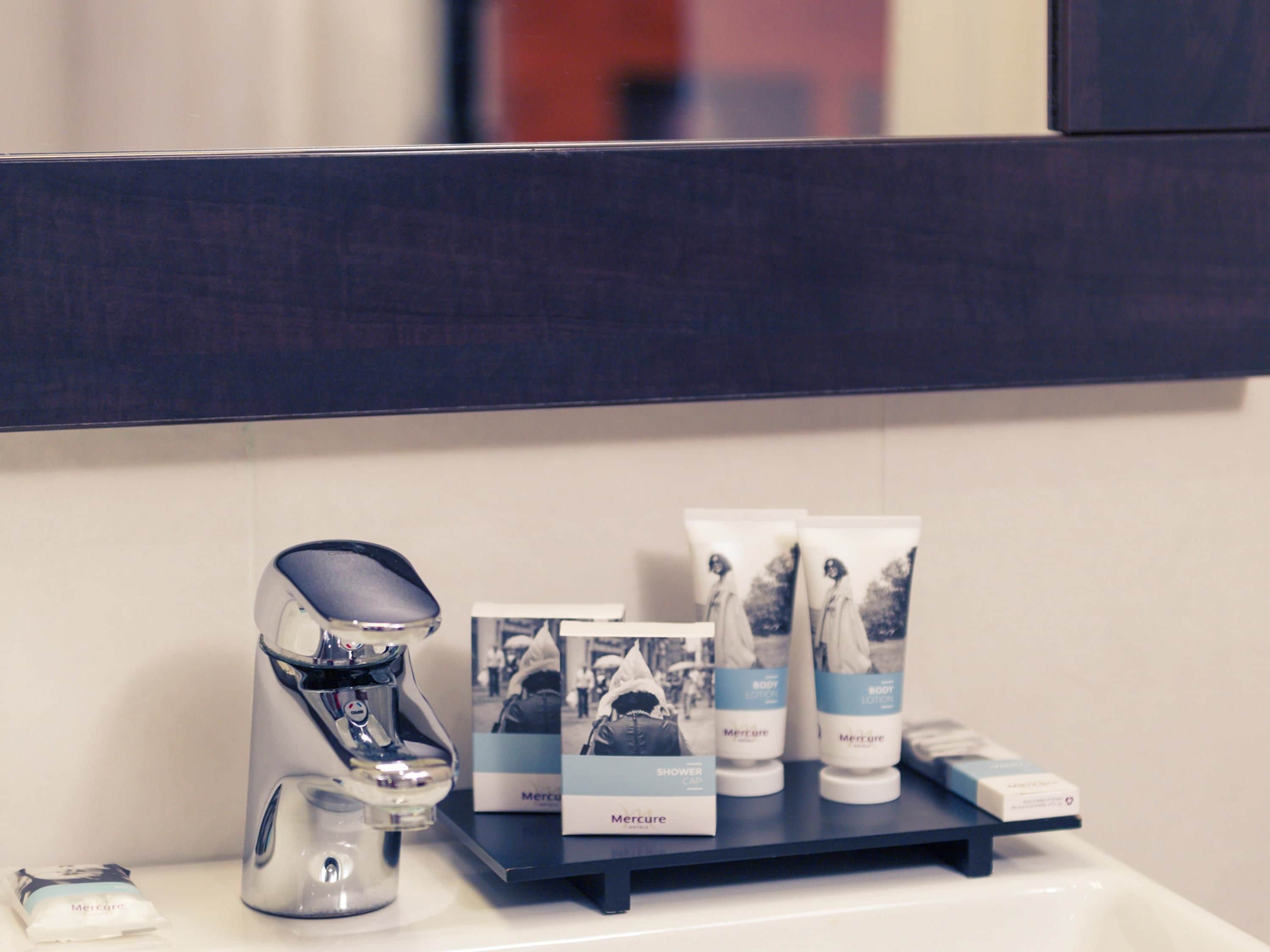 eco-friendly toiletries, hair dryer, towels