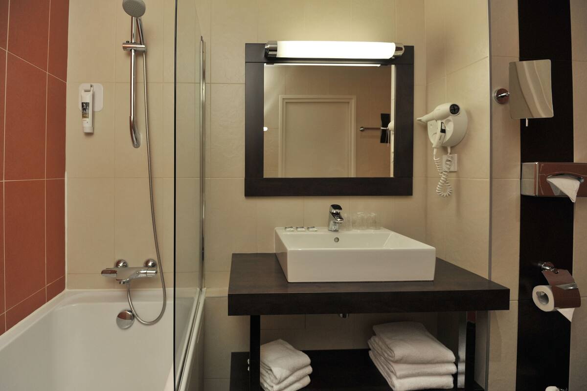 standard twin room, 2 double beds | bathroom | eco-friendly toiletries, hair dryer, towels