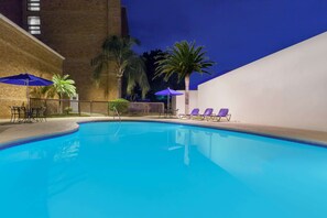 Outdoor pool, open 9:00 AM to 9:00 PM, pool umbrellas