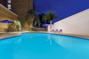 Outdoor pool, open 9:00 AM to 9:00 PM, pool umbrellas