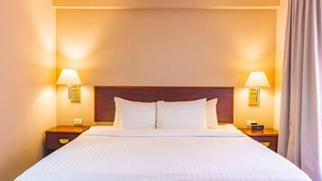 Premium bedding, down duvets, in-room safe, desk