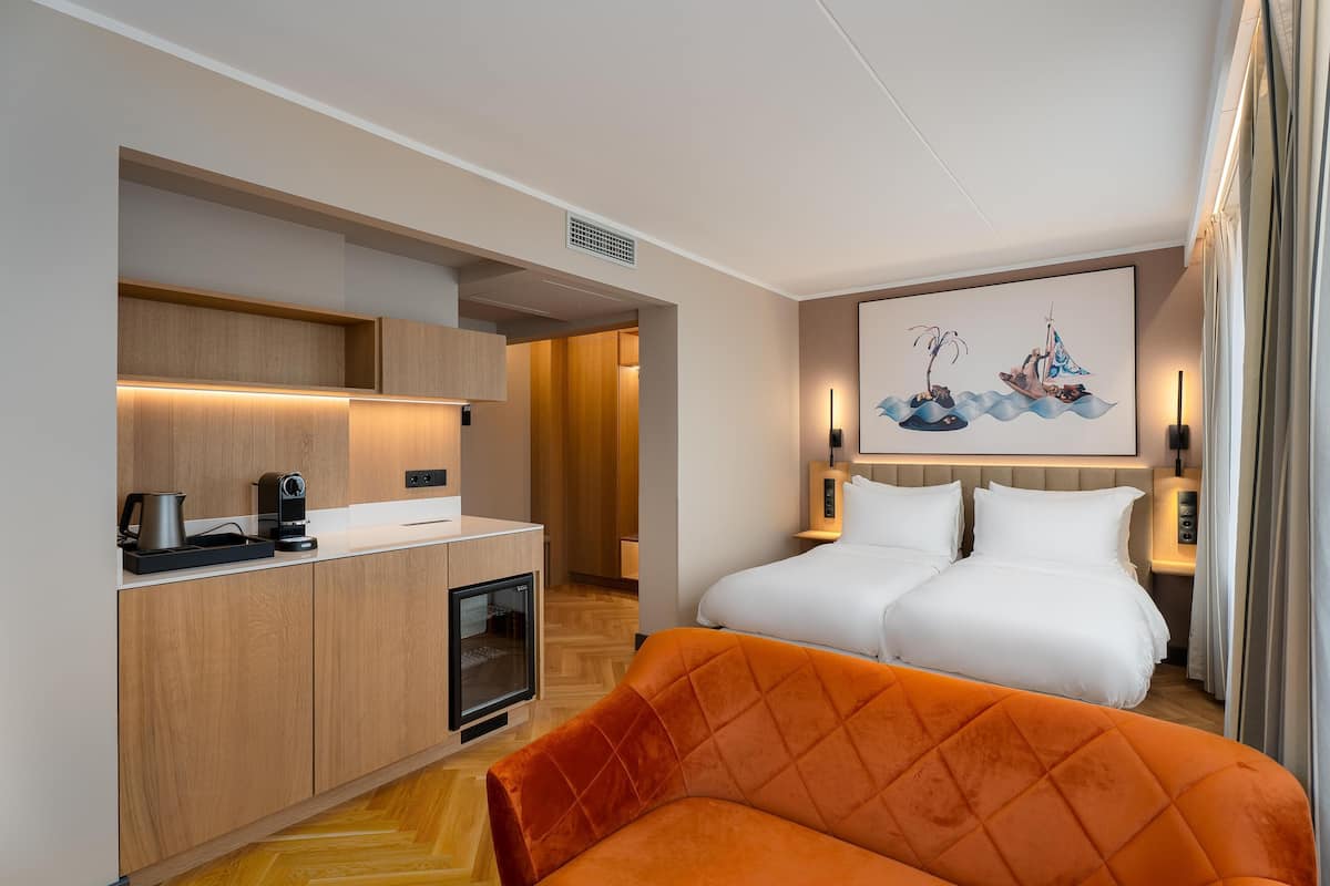 Superior Room (Riverside) | In-room safe, desk, laptop workspace, iron/ironing board