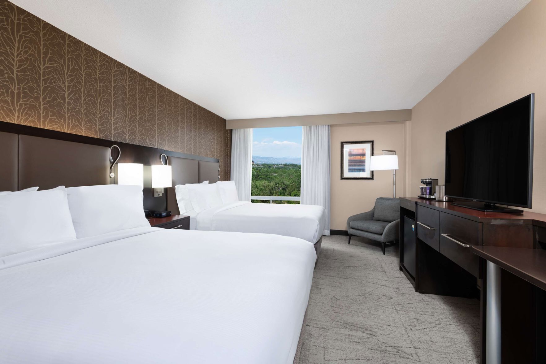 Premium bedding, down comforters, in-room safe, desk