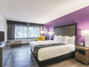 Suite, 1 King Bed, Non Smoking | Premium bedding, desk, blackout drapes, iron/ironing board