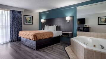 Desk, laptop workspace, blackout drapes, iron/ironing board