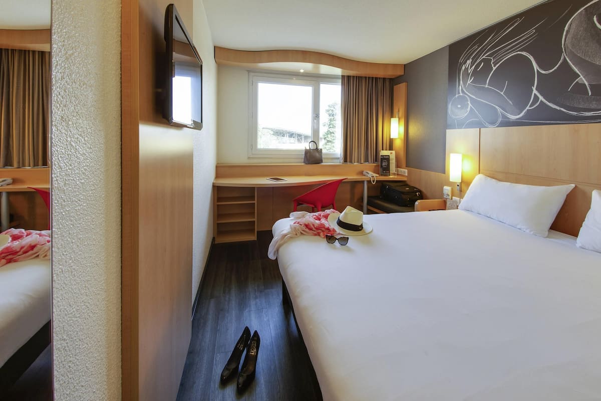 Desk, blackout drapes, soundproofing, iron/ironing board