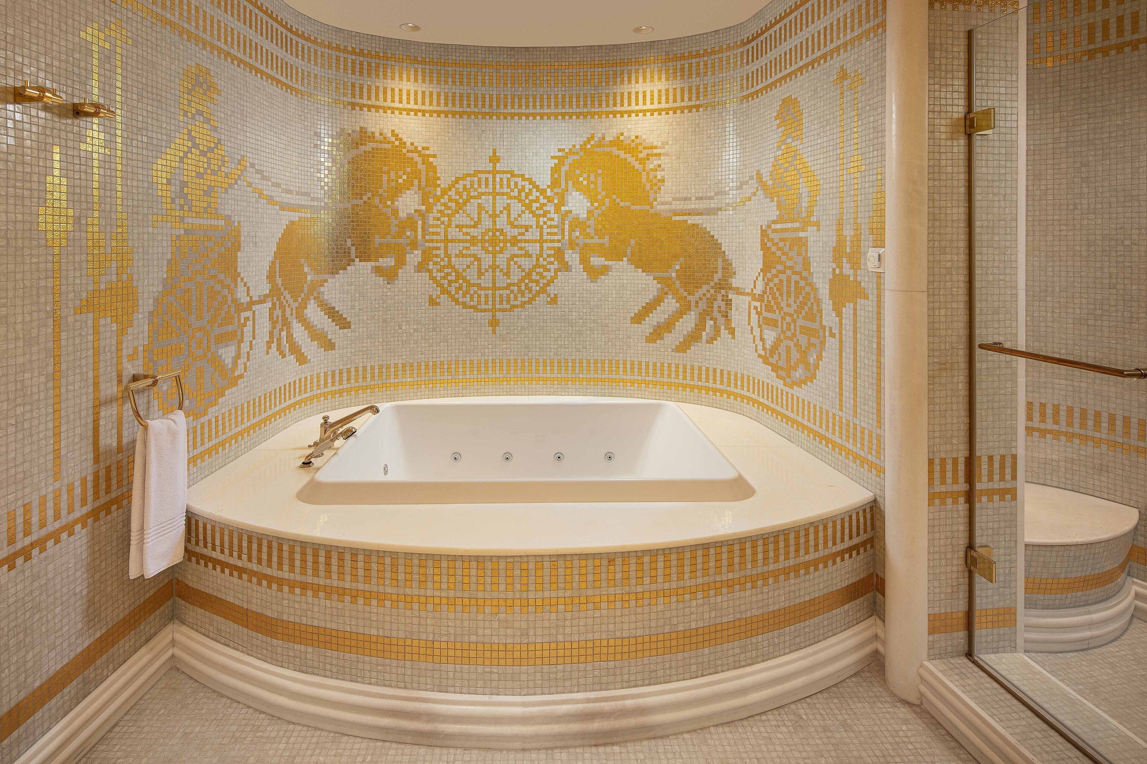 presidential suite, 1 king bed, city view | bathroom | hair dryer, bathrobes, slippers, towels