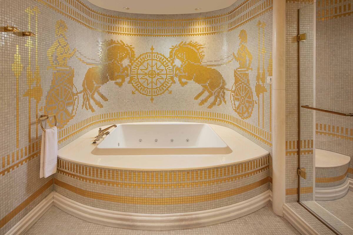 presidential suite, 1 king bed, city view | bathroom | hair dryer, bathrobes, slippers, towels