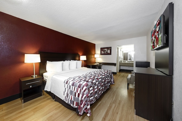 Desk, blackout drapes, cribs (free), WiFi (free)