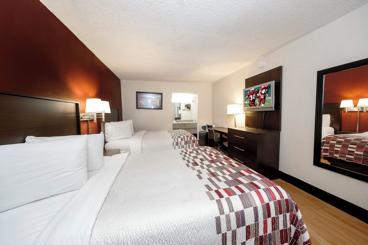 Desk, blackout drapes, cribs (free), WiFi (free)