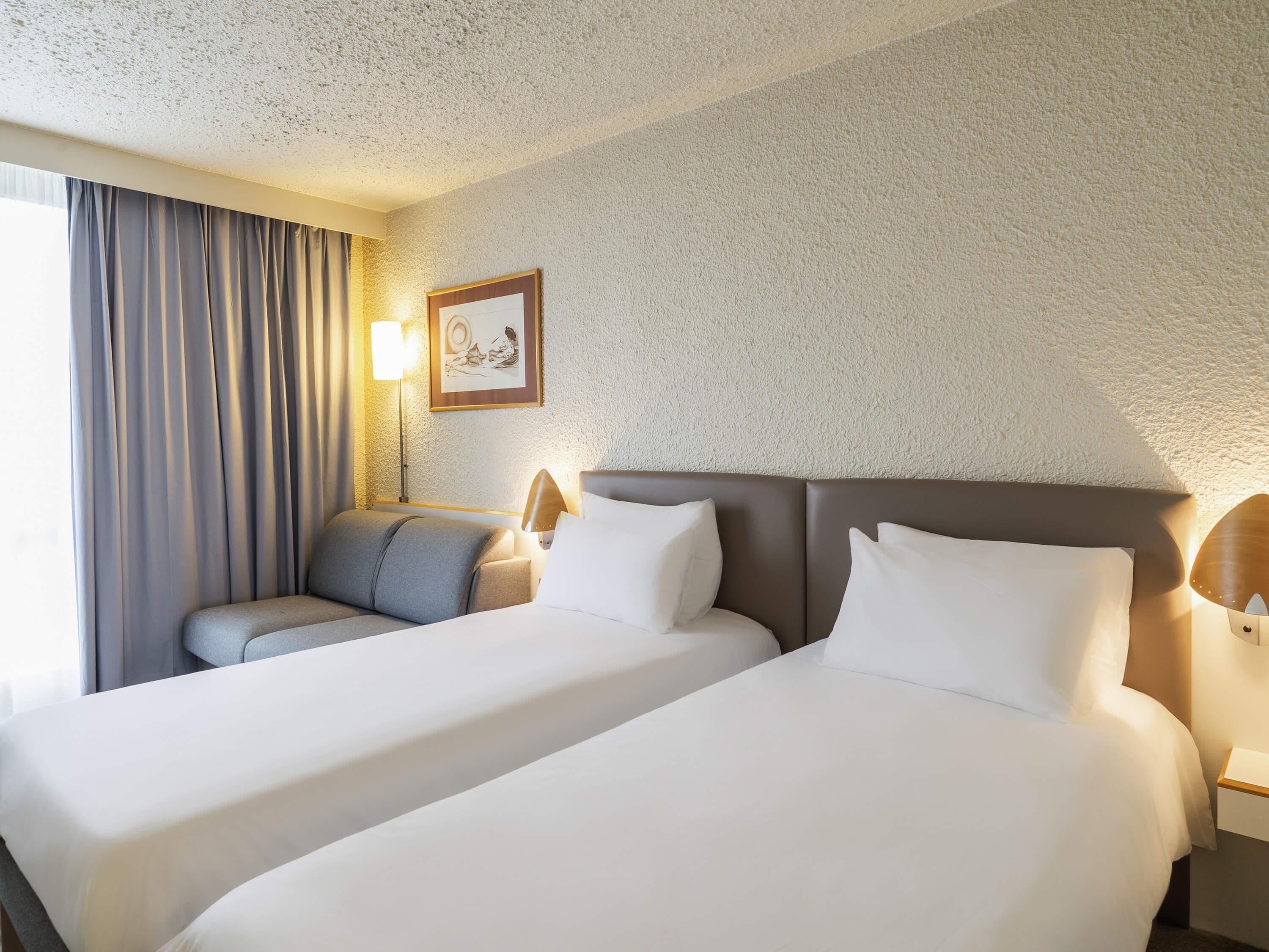 Classic-Zimmer, Mehrere Betten | Hochwertige Bettwaren, Minibar (mit einigen kostenlosen Artikeln)