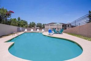 Seasonal outdoor pool, pool loungers