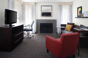 27-inch flat-screen TV with satellite channels, TV, video game console