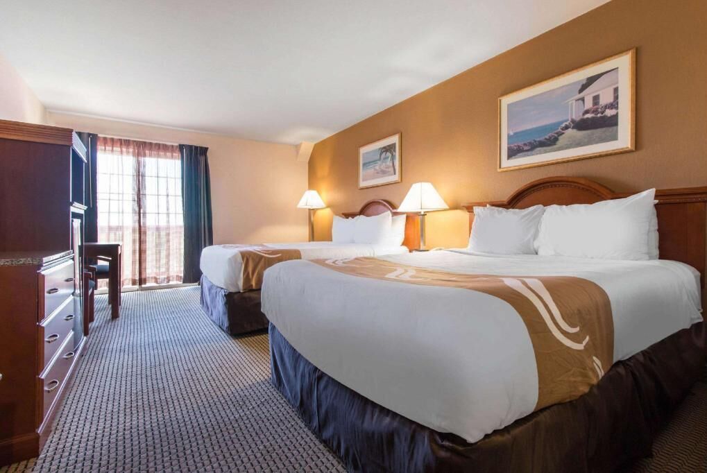 Premium bedding, desk, blackout drapes, iron/ironing board