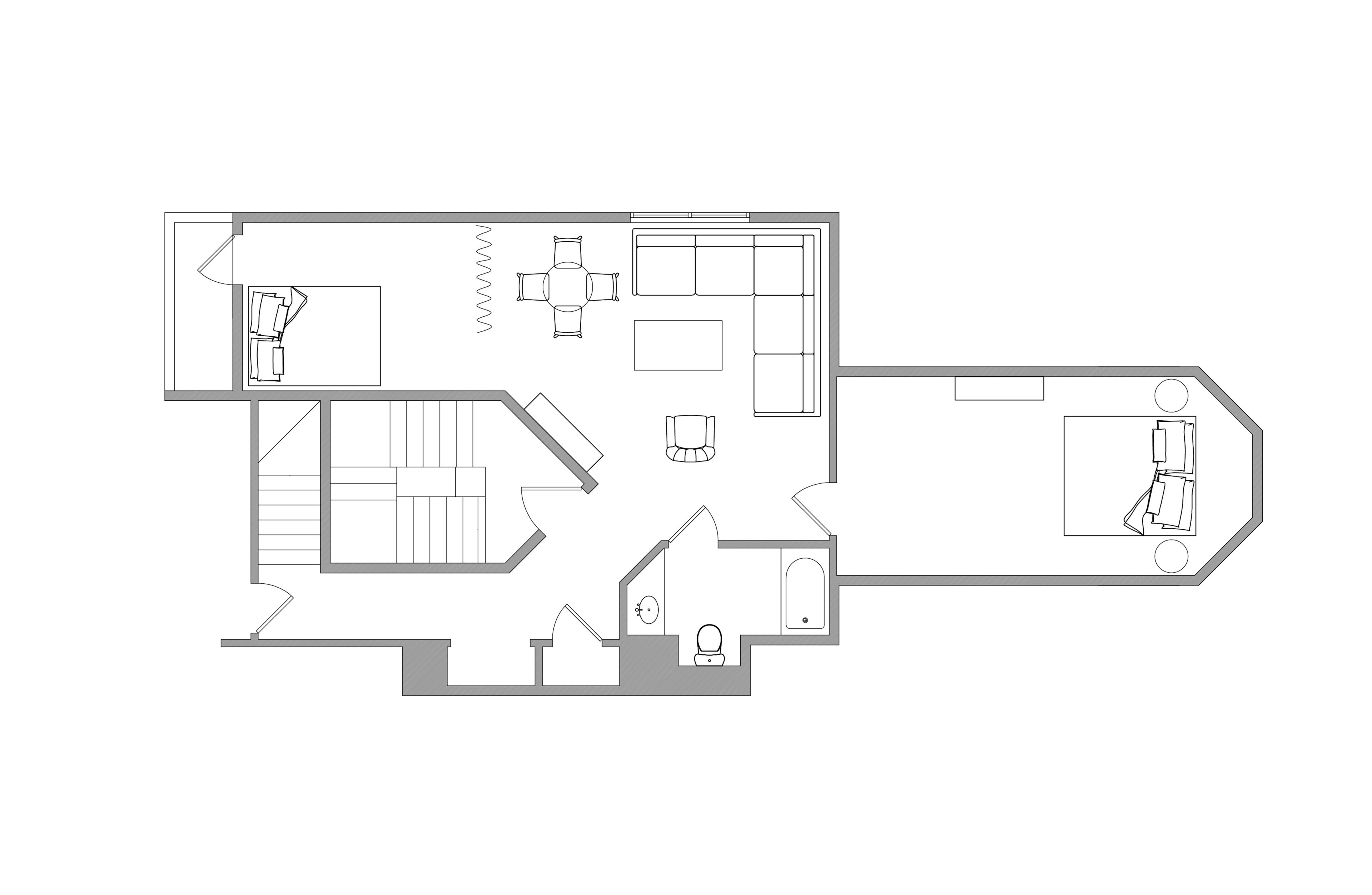 A floor plan with a living room, dining area, kitchen, and two bedrooms.