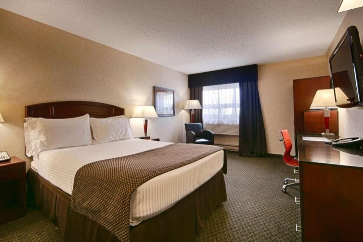 Desk, blackout curtains, iron/ironing board, rollaway beds