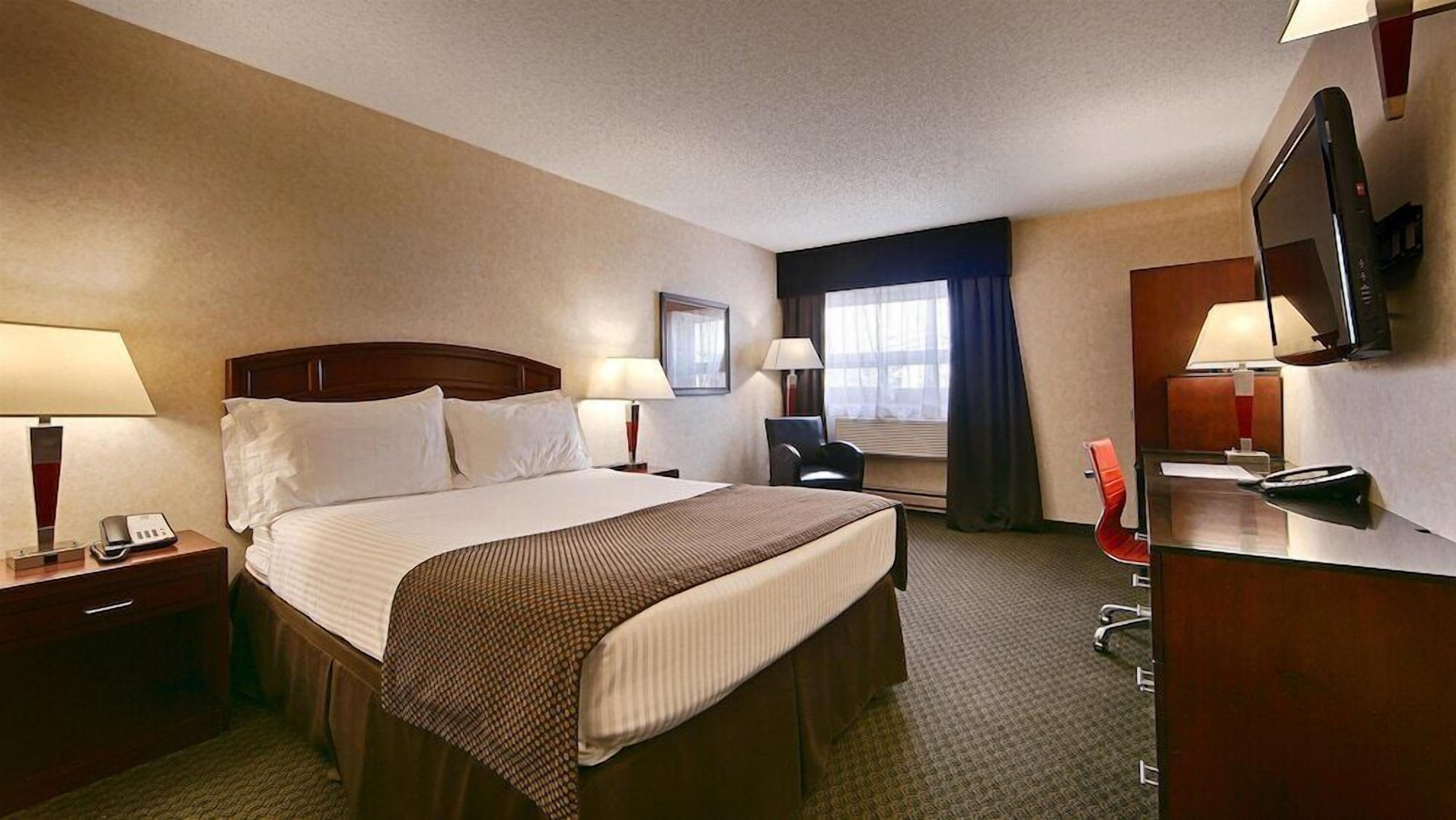 Desk, blackout curtains, iron/ironing board, rollaway beds