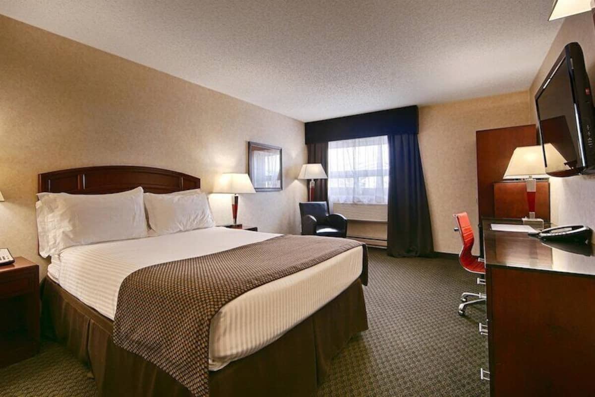 Desk, blackout curtains, iron/ironing board, rollaway beds