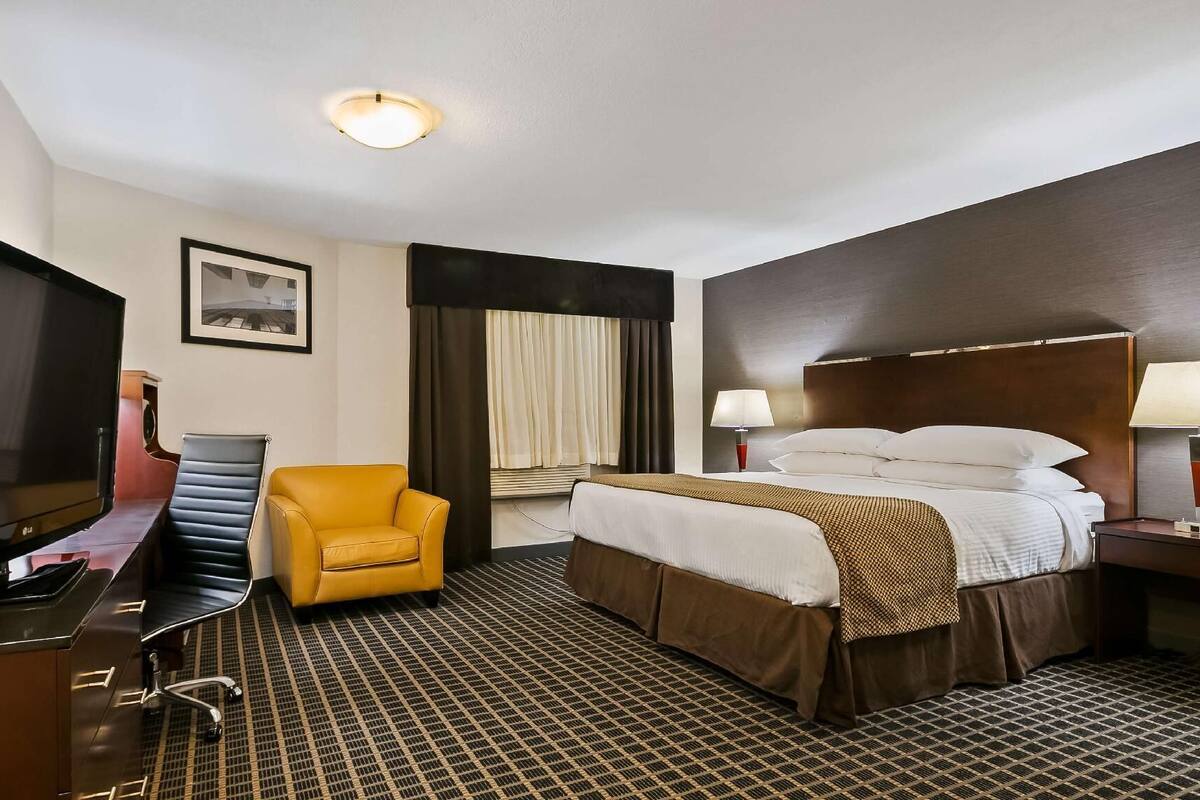 Desk, blackout drapes, iron/ironing board, rollaway beds