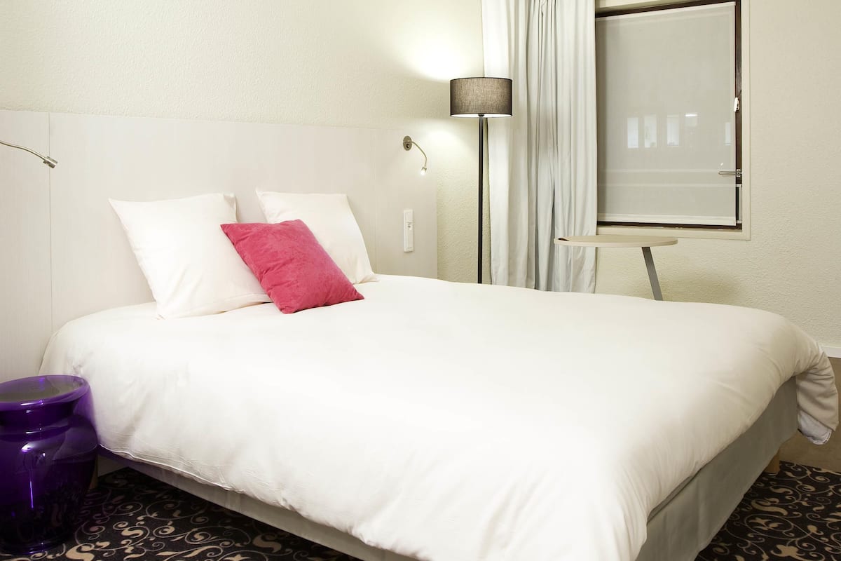 Camas Select Comfort, cofres nos quartos, ferros/tábuas de passar roupa