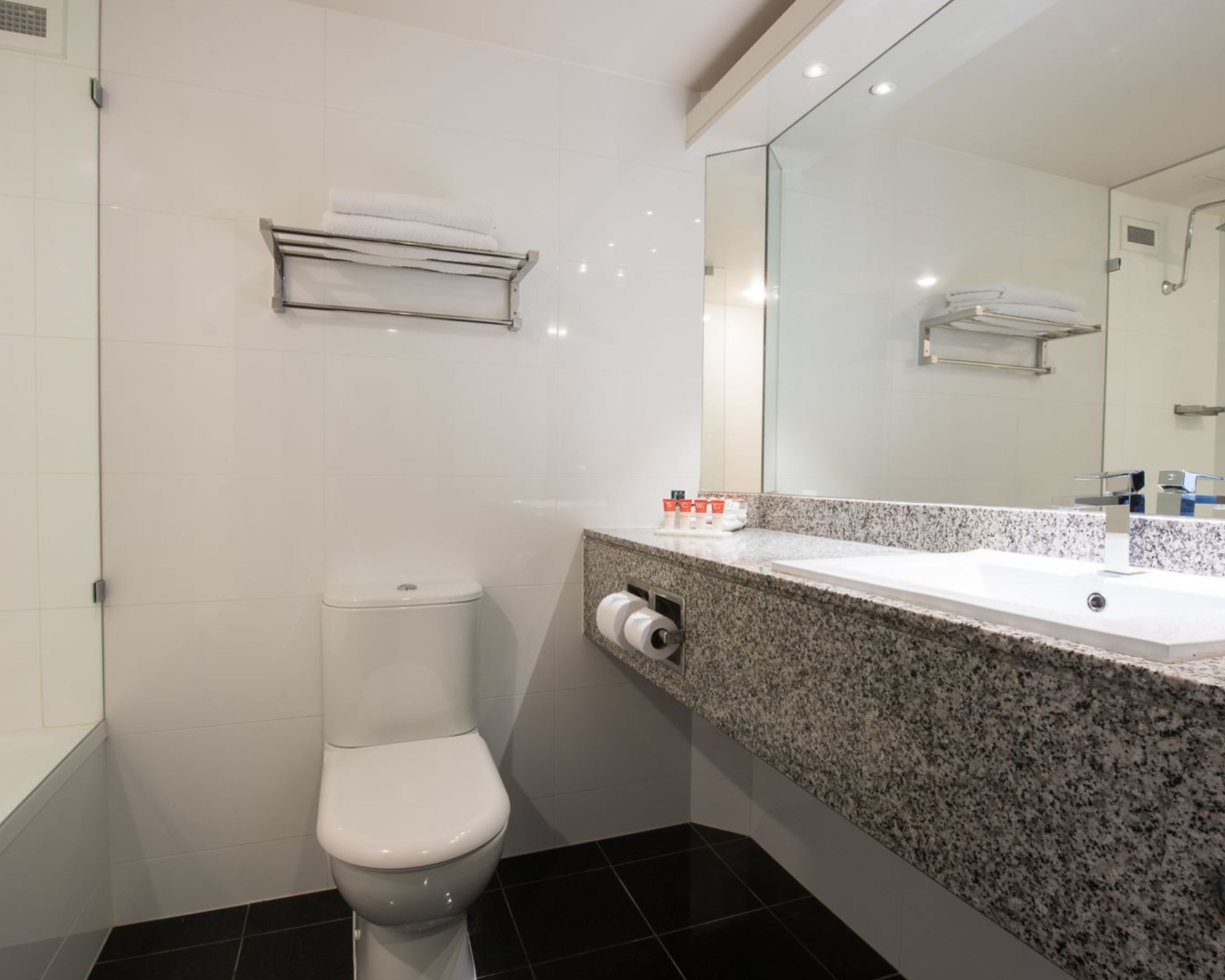 shower, eco-friendly toiletries, hair dryer, towels