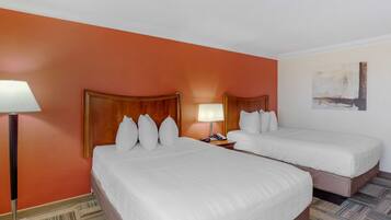 Pillowtop beds, desk, blackout drapes, iron/ironing board