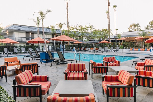 Outdoor pool, open 7:00 AM to 10:00 PM, cabanas (surcharge)