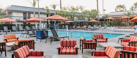 Outdoor pool, open 7:00 AM to 10:00 PM, cabanas (surcharge)