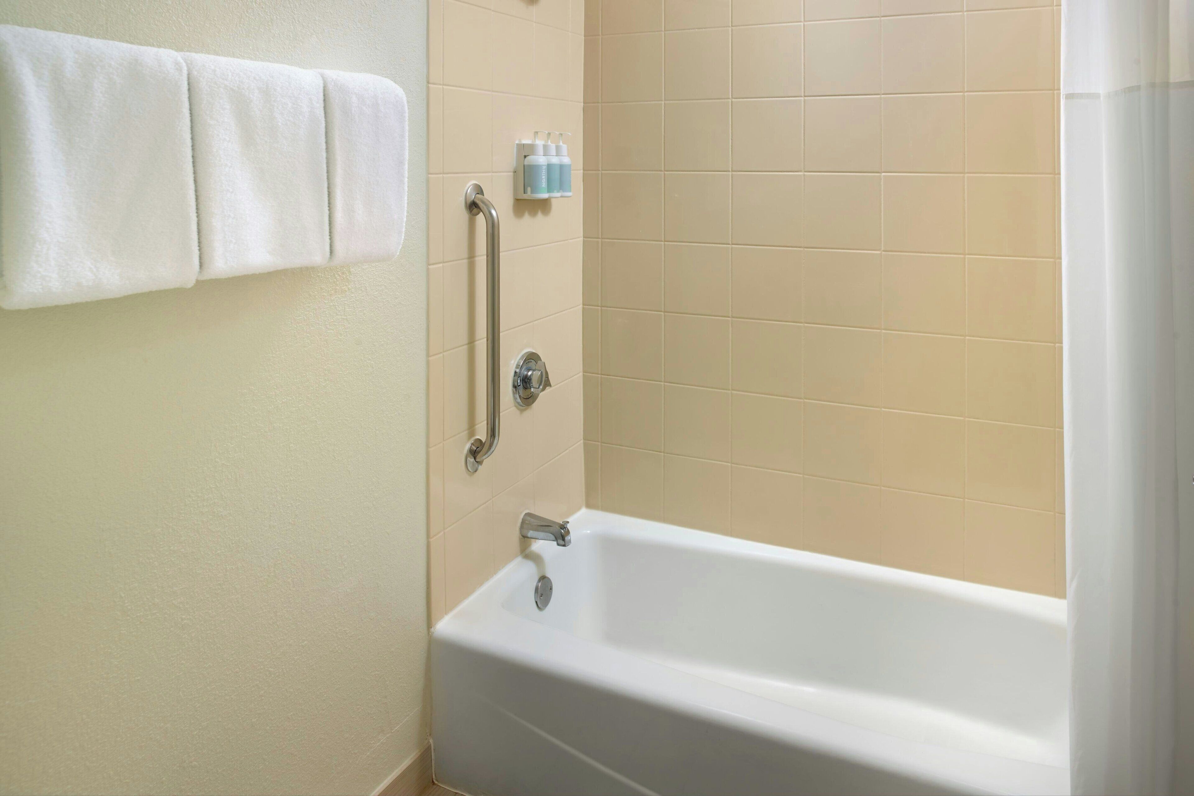 combined shower/bathtub, free toiletries, hair dryer, towels