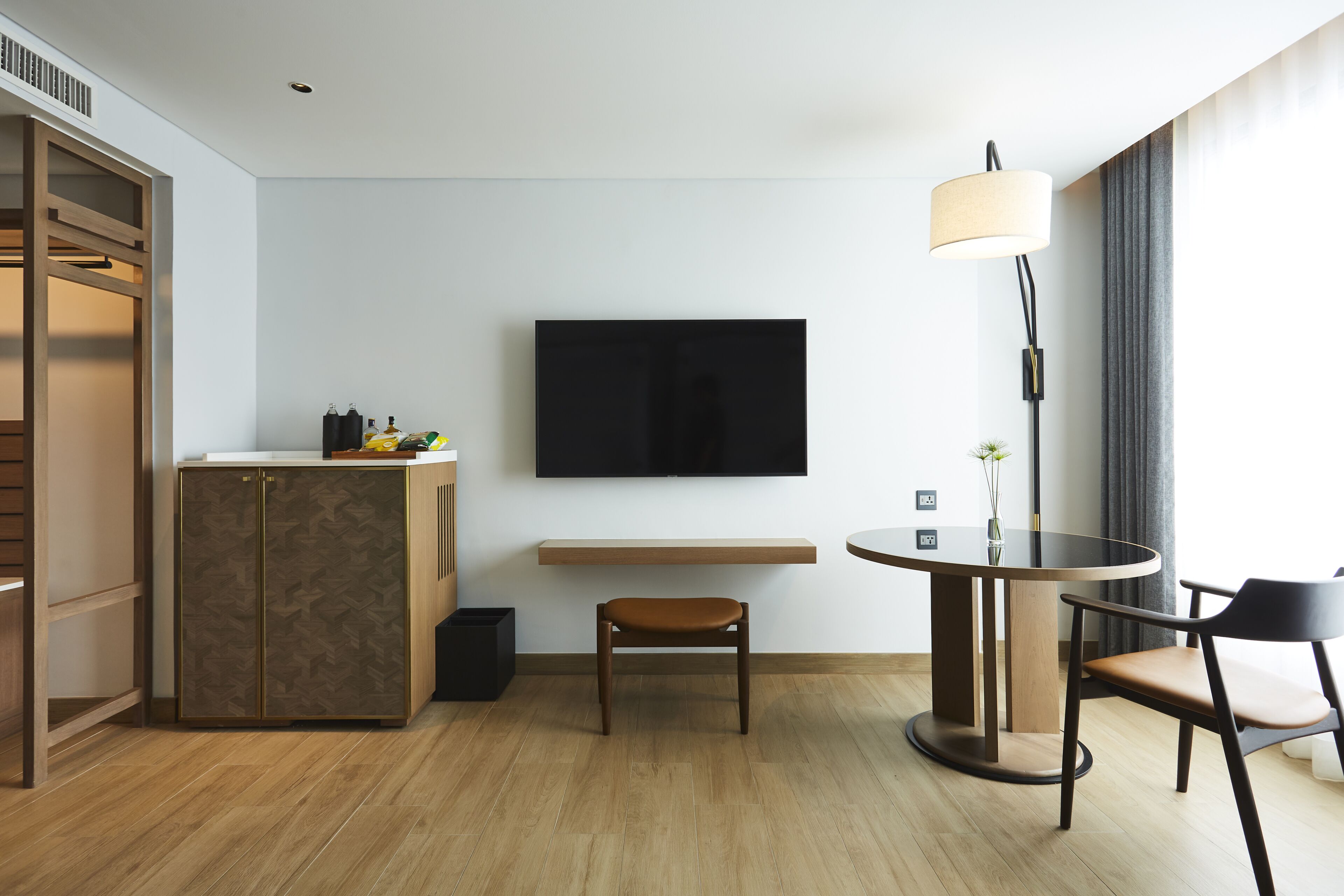 deluxe twin room | living area | 55-inch smart tv with cable channels, tv