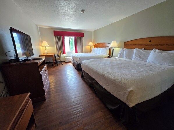 Habitación cuádruple familiar, varias camas | Ropa de cama de alta calidad y colchones con acolchado adicional