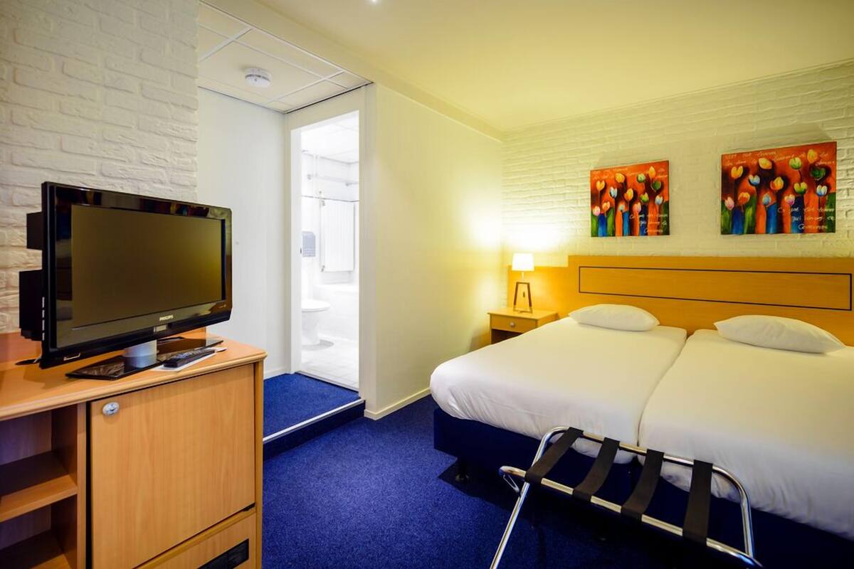 In-room safe, desk, blackout curtains, iron/ironing board (on request)