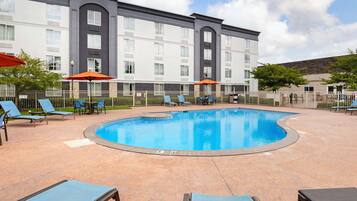 Seasonal outdoor pool, pool umbrellas, pool loungers