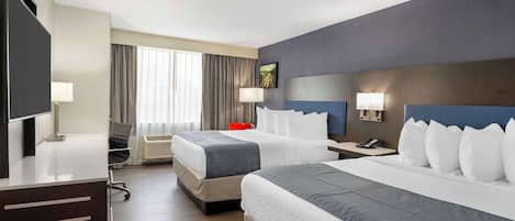 Premium bedding, down comforters, pillowtop beds, in-room safe