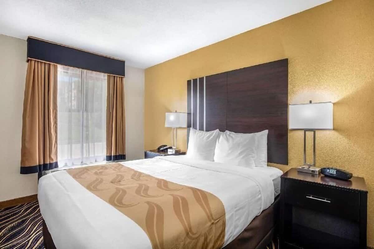 Desk, laptop workspace, blackout drapes, soundproofing