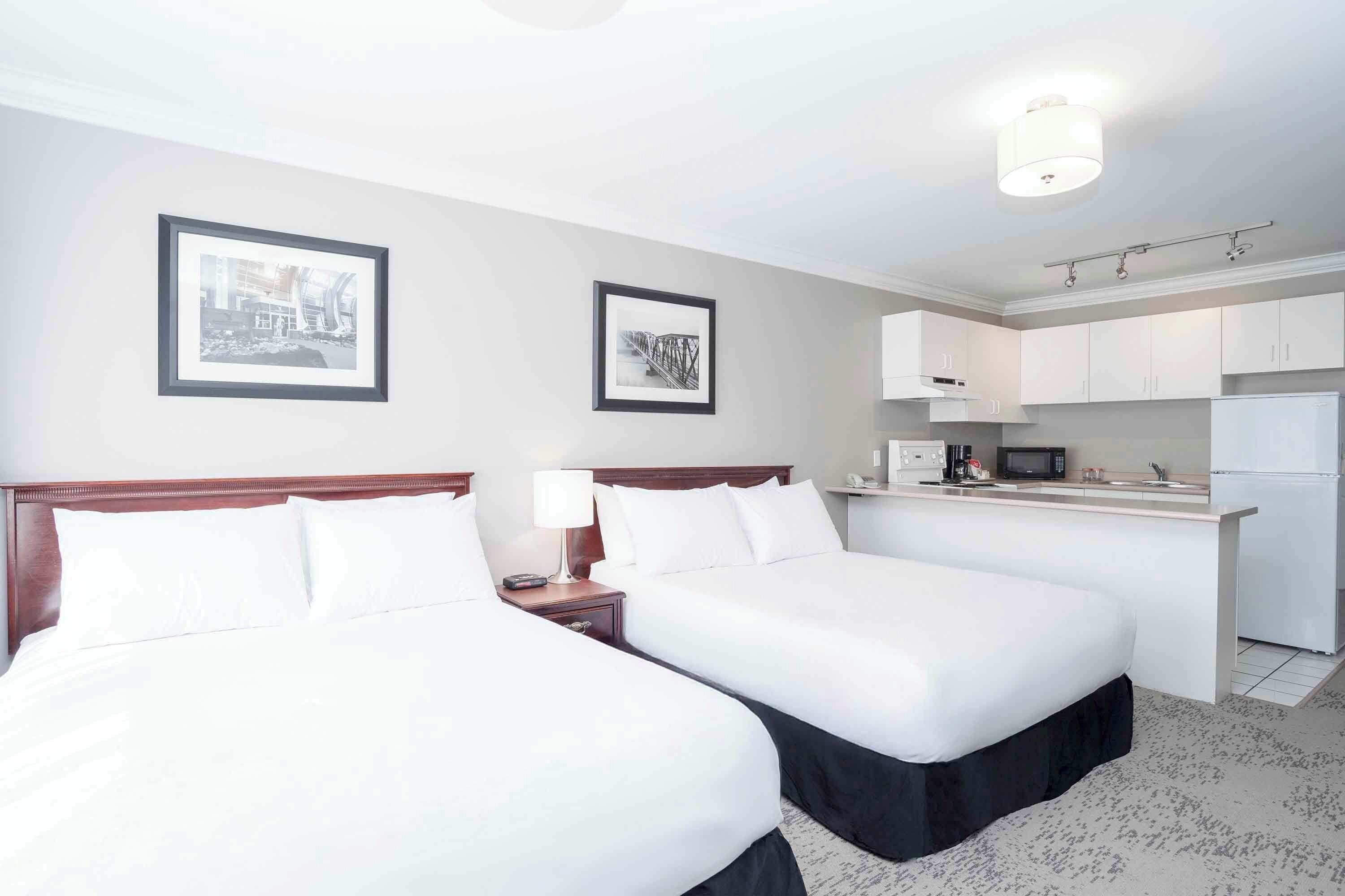 studio suite, 2 queen beds, kitchen | 1 bedroom, desk, laptop workspace, blackout curtains