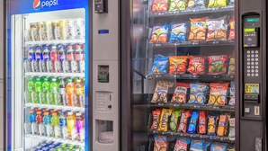 A vending machine with Pepsi and various snack options.