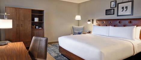 Desk, laptop workspace, blackout drapes, iron/ironing board