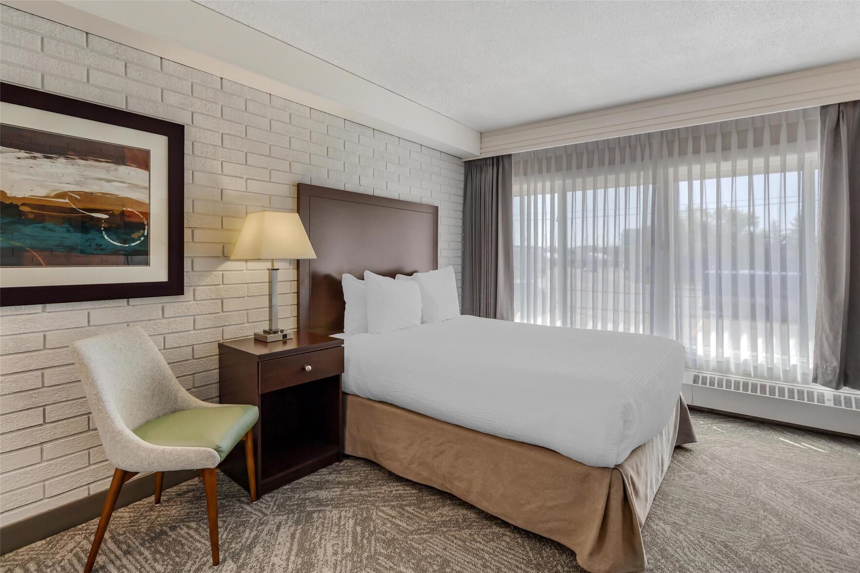 Premium bedding, down duvets, desk, laptop workspace