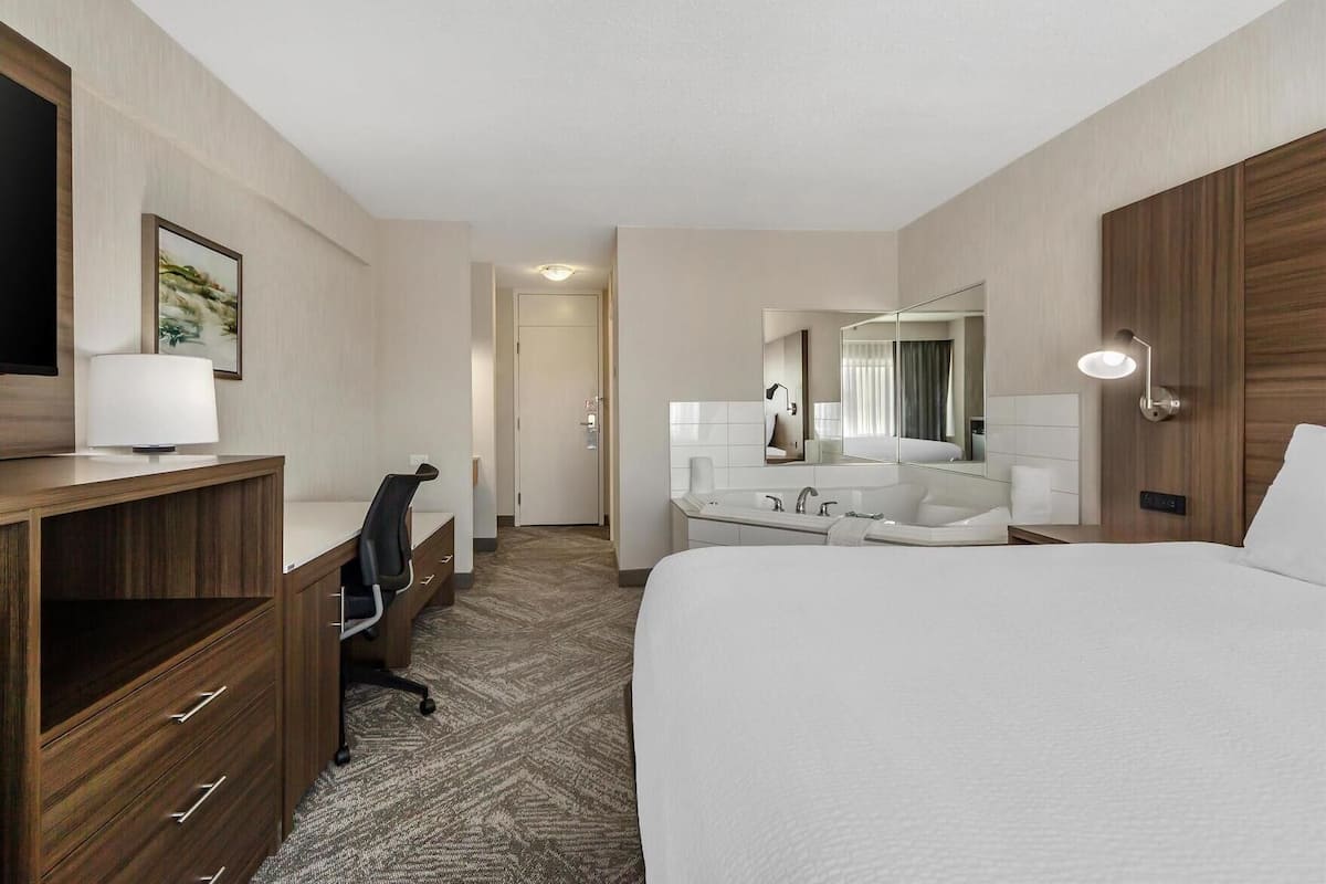 Premium bedding, down comforters, desk, laptop workspace