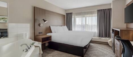 Chambre Standard, 1 trÚs grand lit, non-fumeurs, baignoire à jets | Literie de qualité supérieure, couette en duvet d'oie