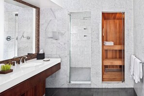 Combined shower/bathtub, deep-soaking bathtub, designer toiletries