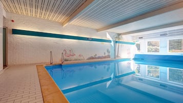 Indoor pool, open 7 AM to 11 PM, pool umbrellas, sun loungers