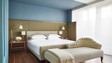 Premium bedding, down comforters, pillowtop beds, minibar