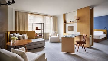 Premium bedding, down comforters, pillowtop beds, minibar